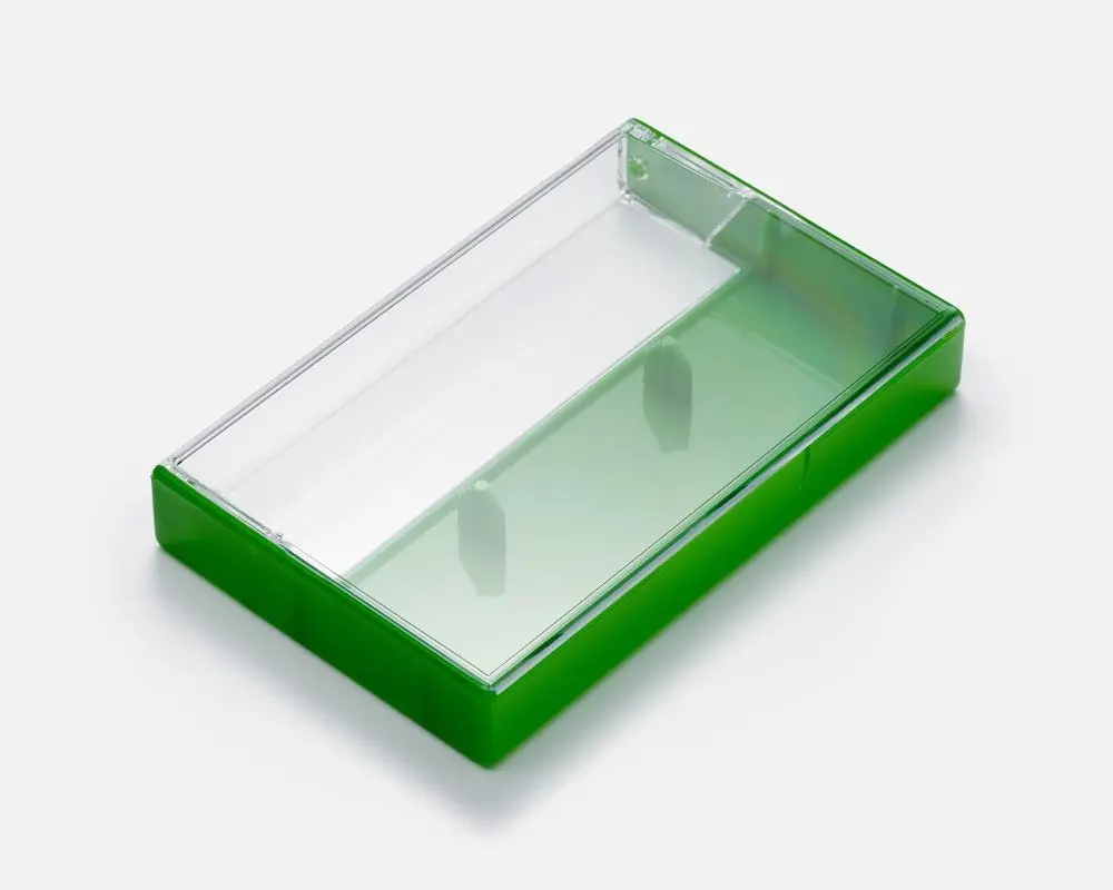 Green‑clear case with pins